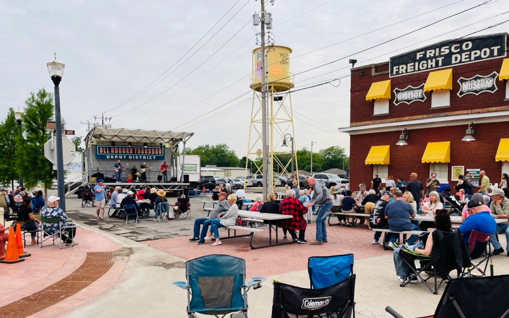 Enjoying the live music at the 2024 All Aboard Thursdays in Muskogee OK.  
