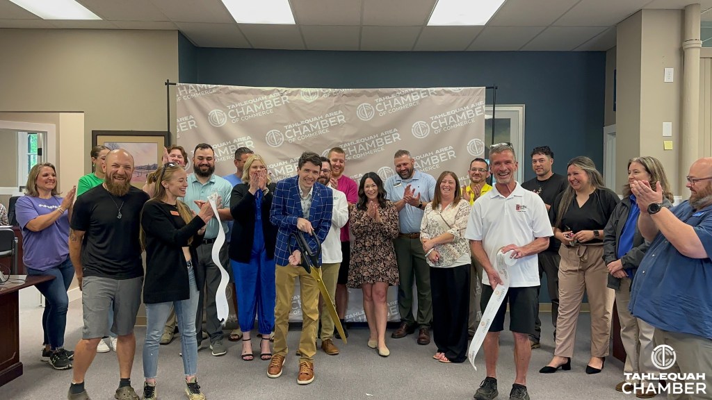 Cutting the ribbon at Tahlequah Oklahoma's Chamber of Commerce