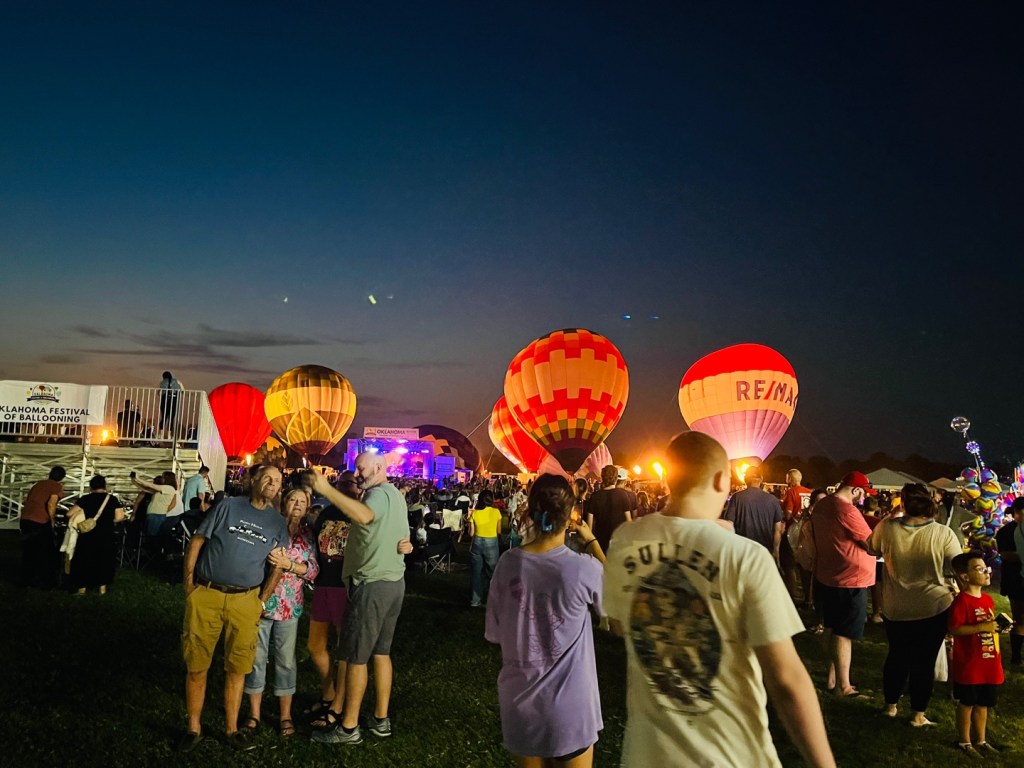 Hot air balloons light up the night at the Oklahoma Festival of Ballooning